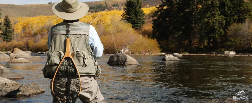 BML - A person fly fishing in the fall